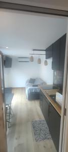 Appartements Chaleureux Studio : photos des chambres