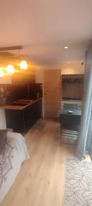 Appartements Chaleureux Studio : photos des chambres