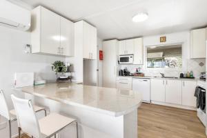 The Blue House on Lake Albert