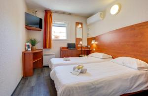 Hotels Brit Hotel Reims La Pompelle : photos des chambres