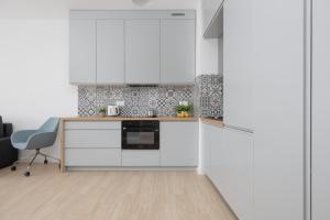 Metro Targówek One Bedroom Apartment for 4 with Furnished Balcony by Noclegi Renters