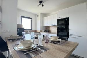 Maisons de vacances Appartement Le 202 - Tain l-Hermitage : photos des chambres