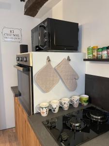 Maisons de vacances La petite maison Triplex au centre ville - Les Terres du Roy : photos des chambres