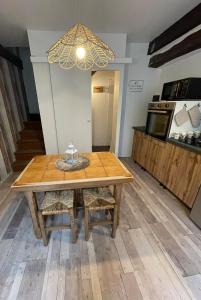 Maisons de vacances La petite maison Triplex au centre ville - Les Terres du Roy : photos des chambres