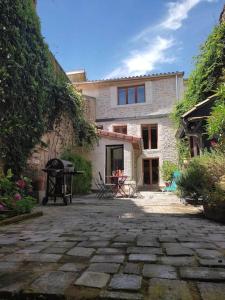 Maisons de vacances Maison de ville : photos des chambres