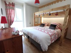 Appartements T2 et T3 L'esprit chalet au coeur du centre ville et 80 m de la telecabine : photos des chambres