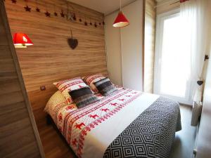 Appartements T2 et T3 L'esprit chalet au coeur du centre ville et 80 m de la telecabine : photos des chambres