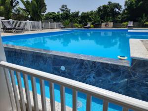 Bella Villa room with large pool and close to beach