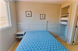 Apartamento no Centro de Bombinhas Prédio na avenida Principal - ao lado de comércio em geral