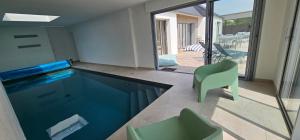 Villas Villa La Greve Blanche avec piscine interieure : photos des chambres