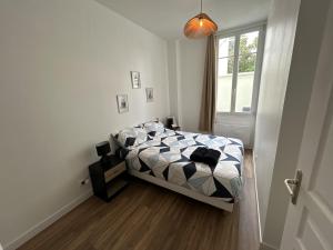 Appartements Centre Ville avec Garage - Parking : photos des chambres