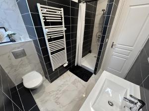 Appartements Centre Ville avec Garage - Parking : photos des chambres