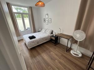 Appartements Centre Ville avec Garage - Parking : photos des chambres