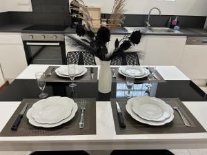 Appartements Centre Ville avec Garage - Parking : photos des chambres