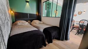 Les Appartements du 104 : photos des chambres