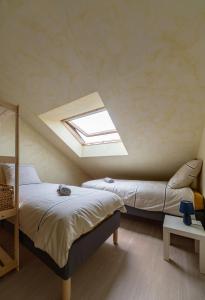 Appartements Le Grenet - Appartement design en duplex : photos des chambres
