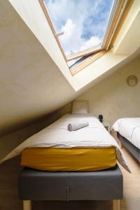 Appartements Le Grenet - Appartement design en duplex : photos des chambres