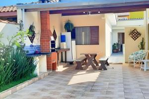 Casa com piscina pertinho do SESC Bertioga