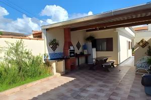 Casa com piscina pertinho do SESC Bertioga