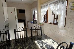 Casa com piscina pertinho do SESC Bertioga