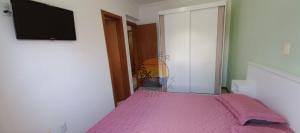 Apartamento com Piscina no Centro da praia Próximo a Praia e Comércio em Geral