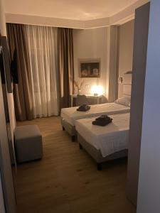 Camera Matrimoniale/Doppia con Letti Singoli con Bagno Privato