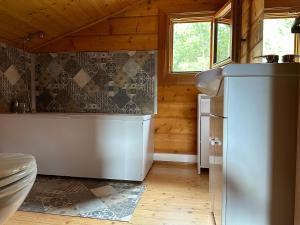 Maisons de vacances COTTAGE ENTRE CONTIS ET MIMIZAN PLAGE - Piscine chauffee et balneotherapie : photos des chambres