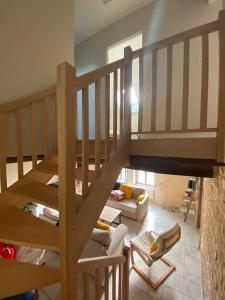 Maisons de vacances La Maison Bleue, maison mitoyenne de campagne : photos des chambres