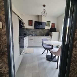 Appartements Joli Appartement de plain-pied : photos des chambres