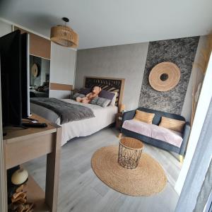 Appartements Joli Appartement de plain-pied : photos des chambres