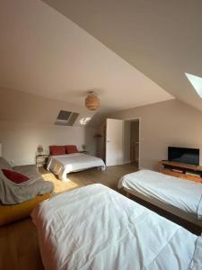 Maisons de vacances La Maison Bleue, maison mitoyenne de campagne : photos des chambres