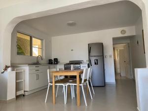 1BR Suite at Villa Costa Verde near Playa Cofresi, Puerto Plata, with a pool, balcony and a rooftop terrace