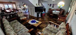 Suítes em rua principal de Socorro-SP