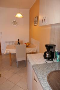 Apartments with parking space Senj - 15376