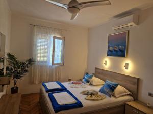 Two-Bedroom Apartment with Terrace room in Apartments by the sea Rogoznica - 4313