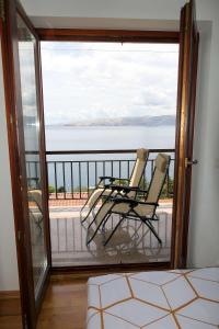 Apartments with parking space Senj - 15376