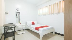 RedDoorz at MGP Apartelle Near Espana