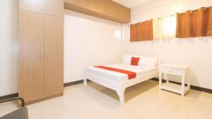 RedDoorz at MGP Apartelle Near Espana