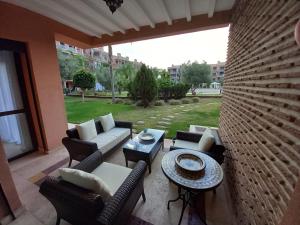 Bel appartement RDJ face piscine résidence haut standing