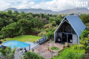 StayVistas Celeste Villa - Hill-View Retreat with Infinity Pool