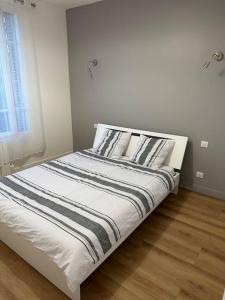 Appartements Modernite proche de Paris et du Stade de France : photos des chambres