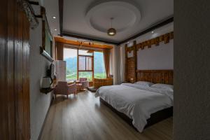 张家界悦庭楠舍民宿-森林公园店 - 3hvězdičkové hotely ve městě Čang-ťia-ťie