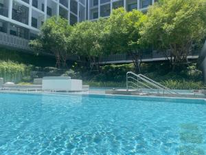 7DusitD2 Hua Hin - One bedroom with a beautiful view of the garden and pool