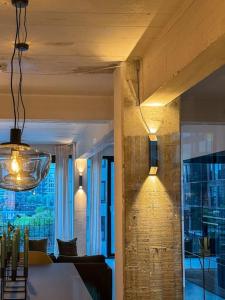 Stunning Industrial-Style Loft by the Canals