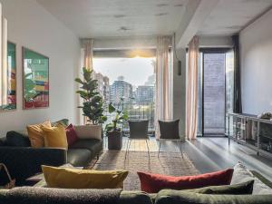 Stunning Industrial-Style Loft by the Canals