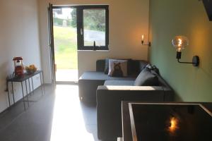 Huis 3landenpunt AT-SLO-IT bij de piste