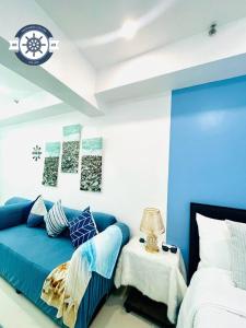 Ocean theme Navy Blue Deluxe Suite with PS4 and Balcony overlooking Manila Bay and Manila Zoo plus near Manila Yacht Club and Star City