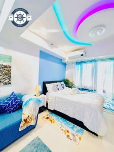 Ocean theme Navy Blue Deluxe Suite with PS4 and Balcony overlooking Manila Bay and Manila Zoo plus near Manila Yacht Club and Star City