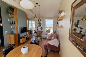 Appartements Le toit chic a 15 mn Paris Centre : photos des chambres