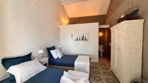 Maisons de vacances Le Mas de Bonnety - Magnifique mas 12 personnes au Pied du Mont Ventoux : photos des chambres